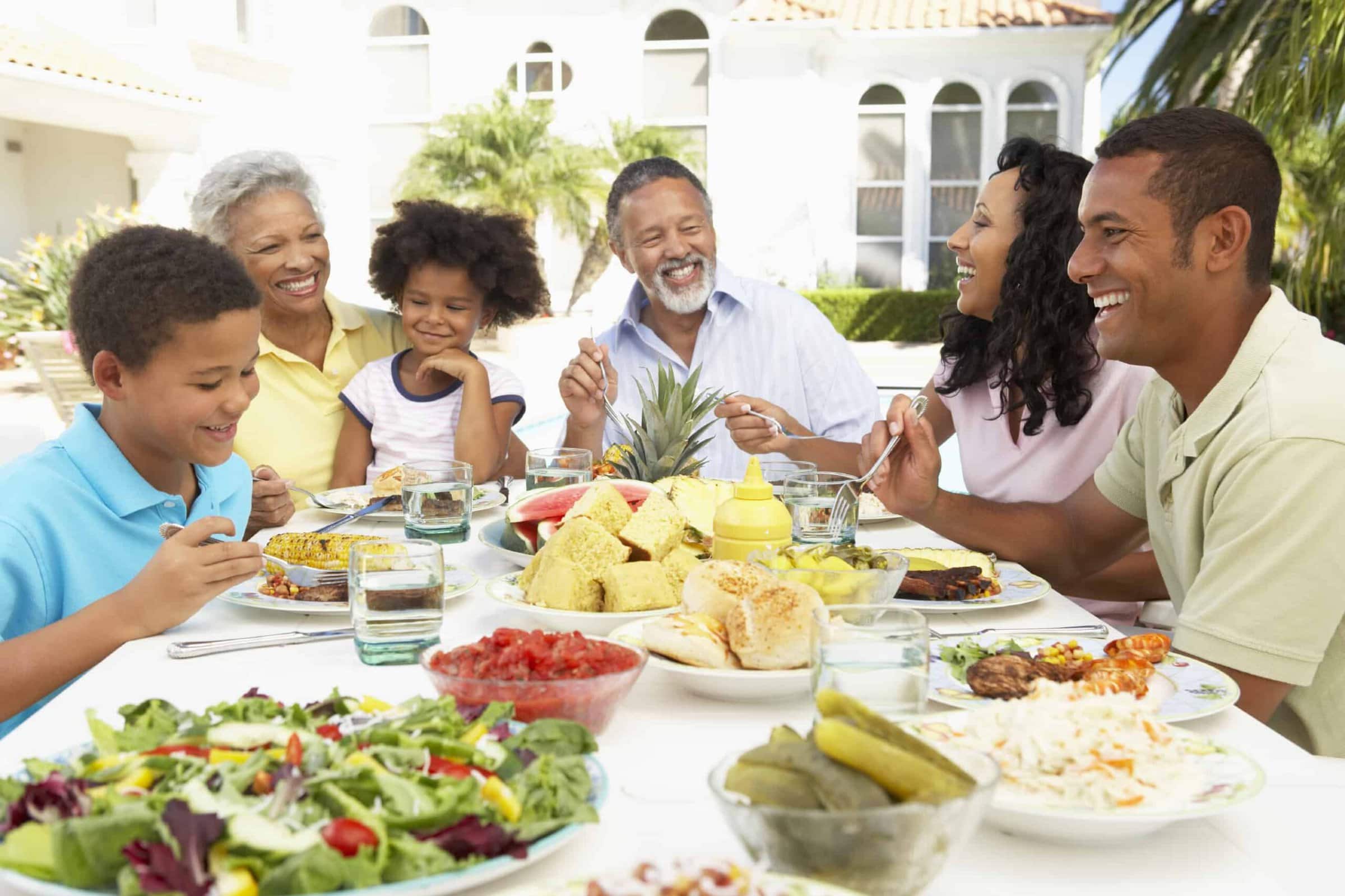 Family Eating An Al Fresco Meal Family Eating An Al Fresco Meal