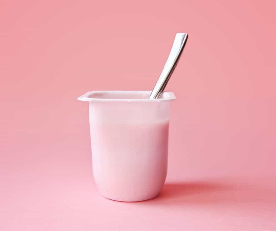 strawberry yogurt in plastic cup