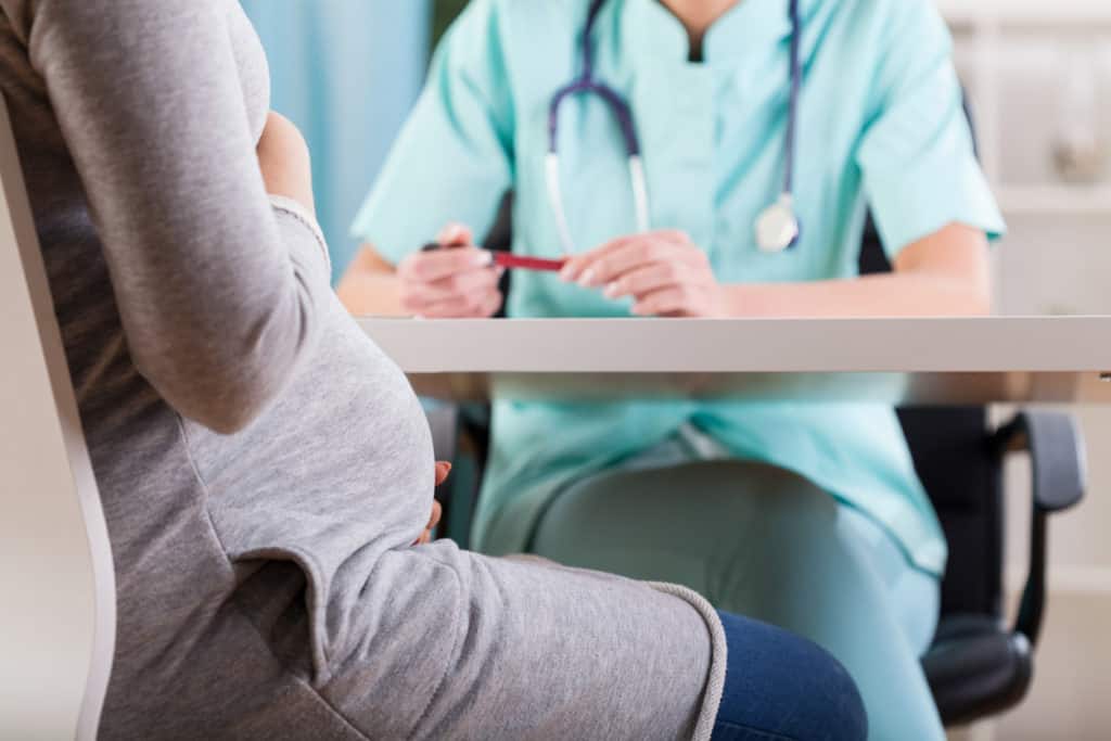 Close-up of a pregnant woman during medical visit