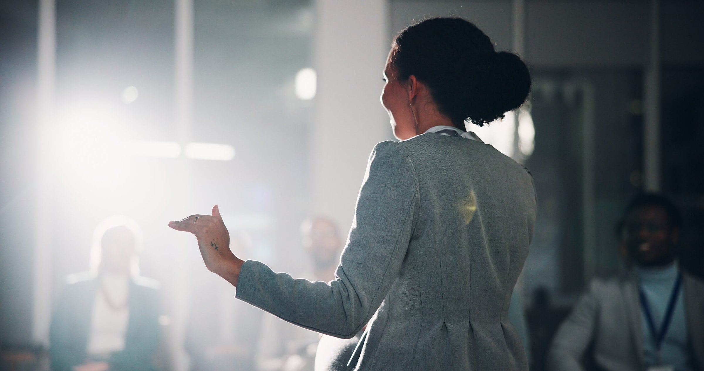 Woman,,Speaker,And,Audience,At,Convention,,Stage,Or,Discussion,With Woman,,Speaker,And,Audience,At,Convention,,Stage,Or,Discussion,With